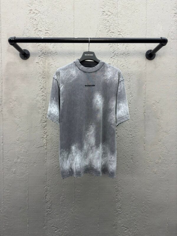 Balenciaga paint, splashed ink, embroidered lettering, short sleeves